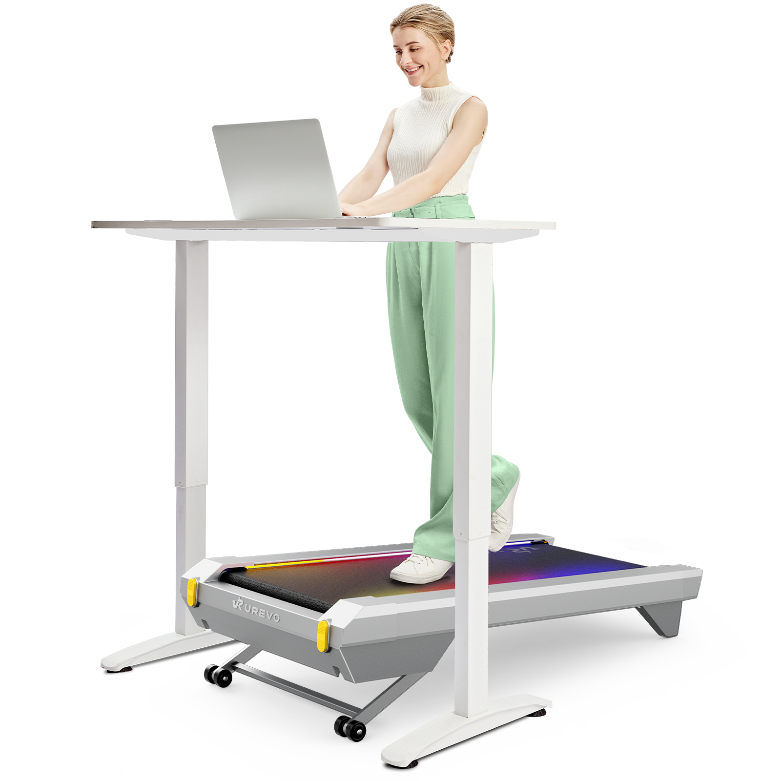 A woman uses a laptop on the UREVO CyberPad for Office Smart Treadmill, combining work with exercise.