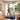 UREVO Walking Pad Handrail: Woman using the handrail for secure grip and stability during walking exercise